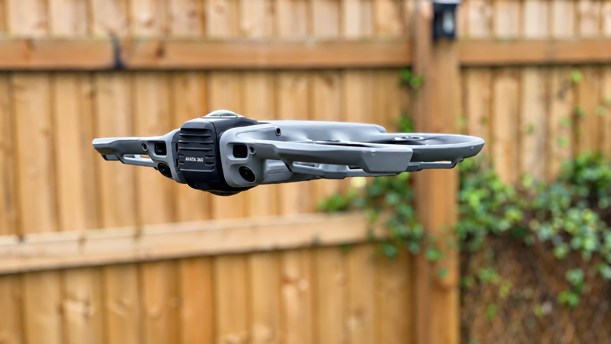 Compact FPV drone in flight, illustrating the technology used for immersive property video in Plymouth