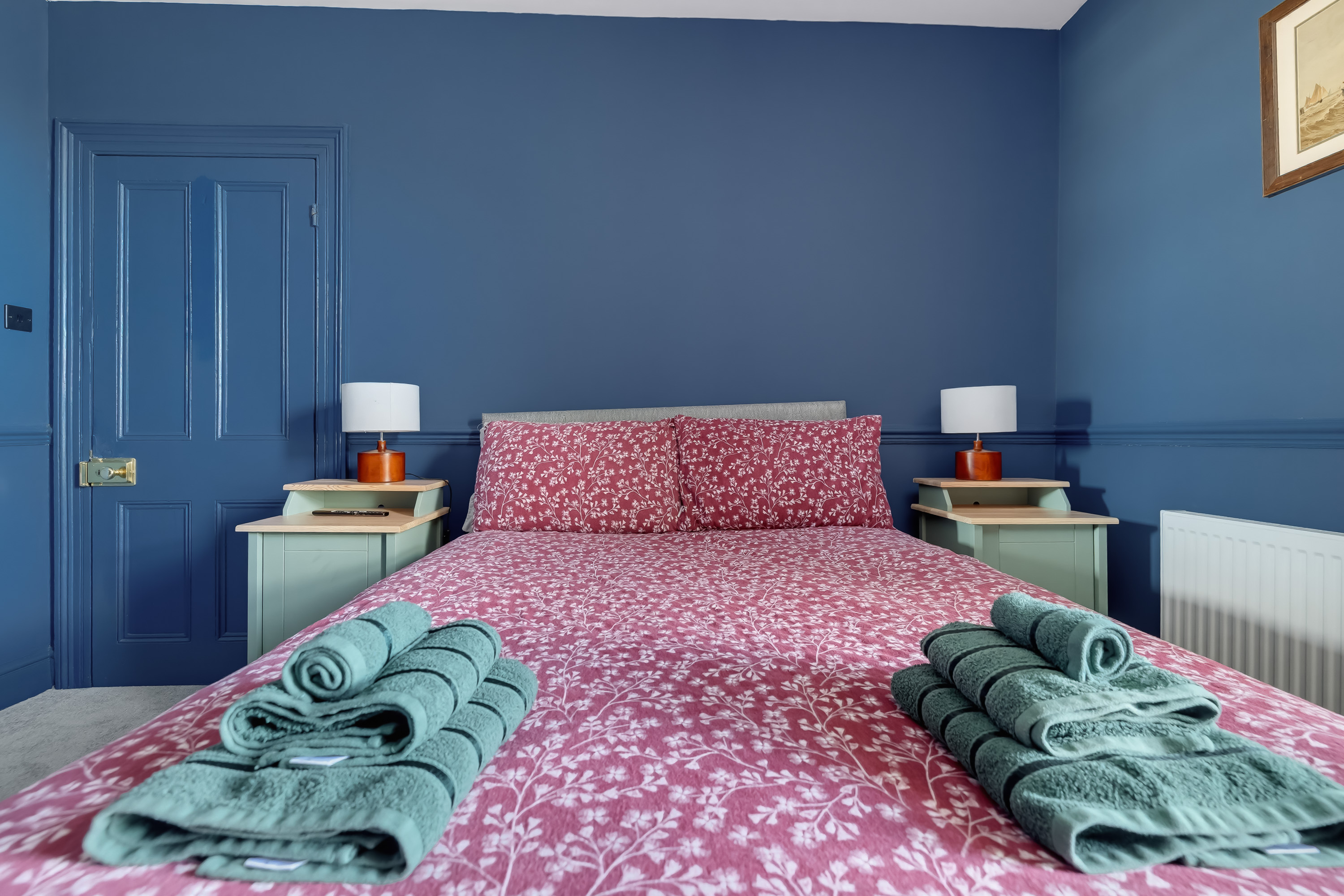 Guest-ready Airbnb bedroom with neatly presented bedding